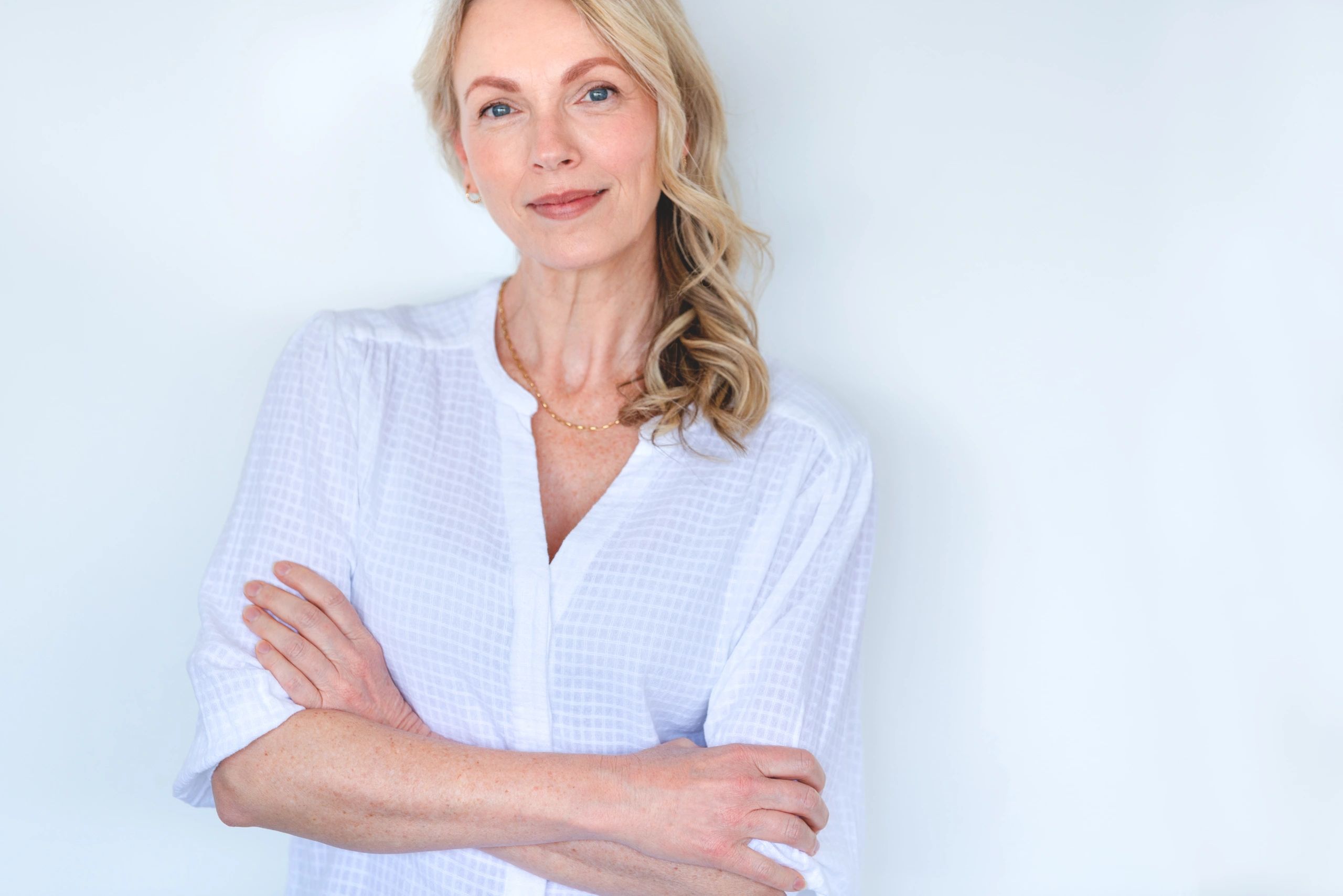 Warm portrait of a confident woman representing concierge wellness support