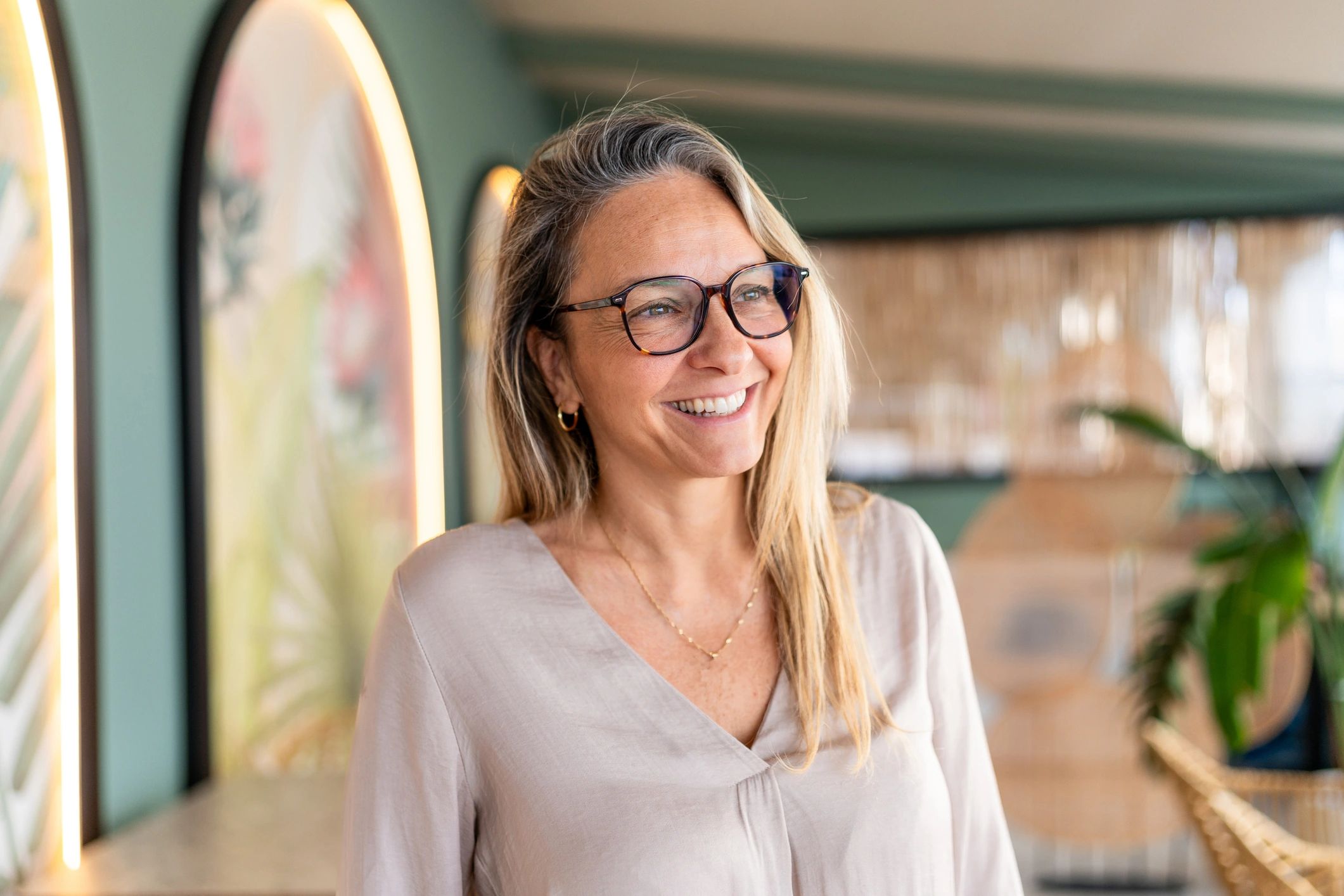 Mature woman smiling in natural light